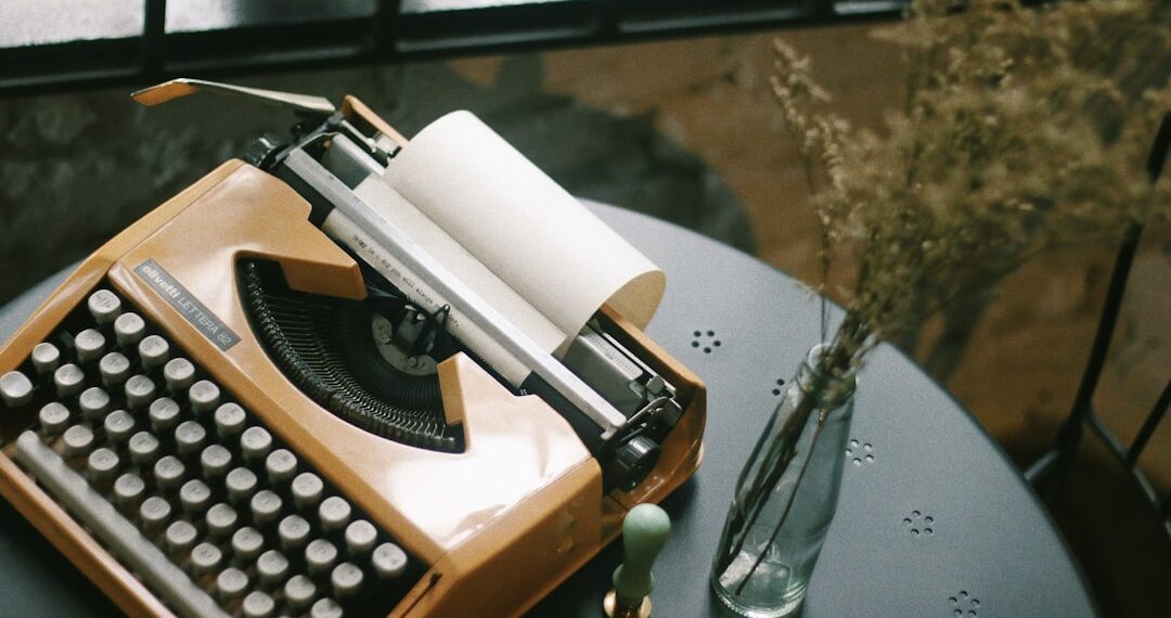 Vintage typewriter for typing. Styled desk with dried flowers & a wax seal stamp.