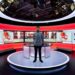 Male broadcast engineer in studio