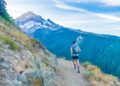 It seemed like a crazy dream: could we run a 43 mile hiking route in one day? Neither of us had ever tried such an ambitious adventure. Here, my friend spots the mountain for the first time. We made it around!